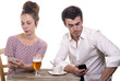 young couple with their phones are Disgruntled