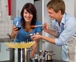 Happy young couple in the kitchen