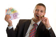 Businessman holding cigar and euro banknotes in hands